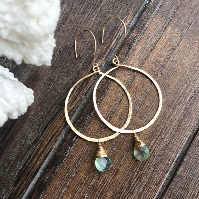 Hammered Front Facing Hoops with Seafoam Fluorite Drops  14k gold filled hand hammered hoops shine with an accent of faceted fluorite.    Fluorite removes and neutralizes negative energy and stress.